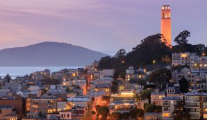 The Coit Tower lit orange. If you have been discriminated against, contact the San Francisco discrimination lawyers at our law firm.