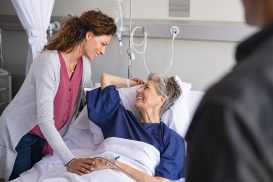 Woman visiting her mother in hospital when needing to care for loved one and needing FMLA Lawyer Santa Rosa.
